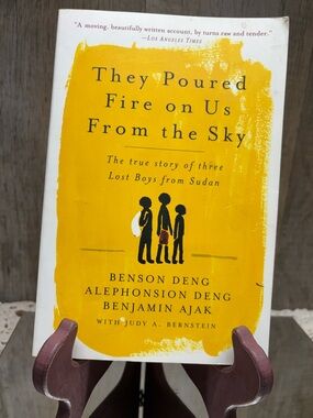 They Poured Fire on Us from the Sky : The True Story of Three Lost Boys From...